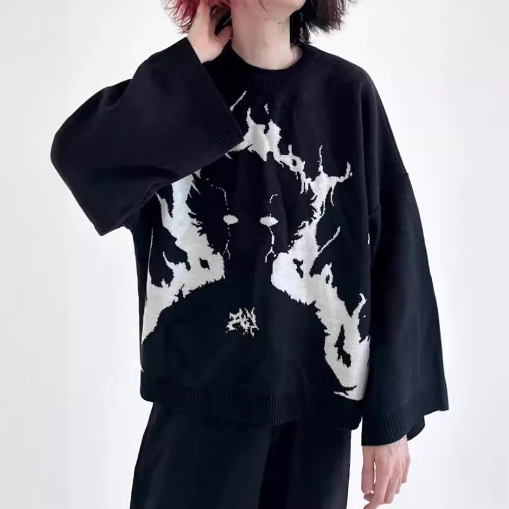 A person wearing a Seakoff Premium Mob Psycho 100-Inspired Knit Sweater featuring Shigeo Kageyama's 100% Power Jacquard Design with long, loose sleeves pairs it seamlessly with black pants against a plain white background.