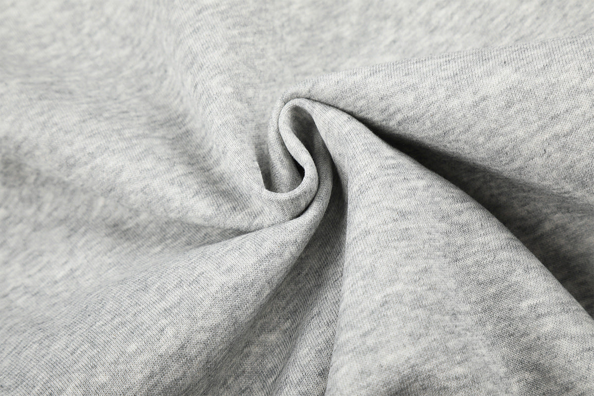 Sweat à capuche zippé avec écusson croix clouté et doublure camouflage