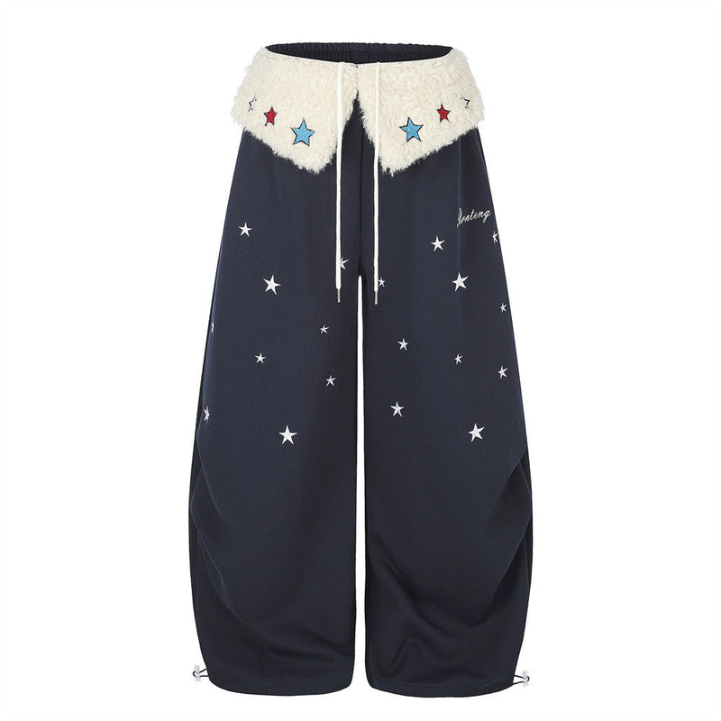 Sweatpants mit weitem Bein, Sternstickerei und umgeschlagenem Sherpa-Bund