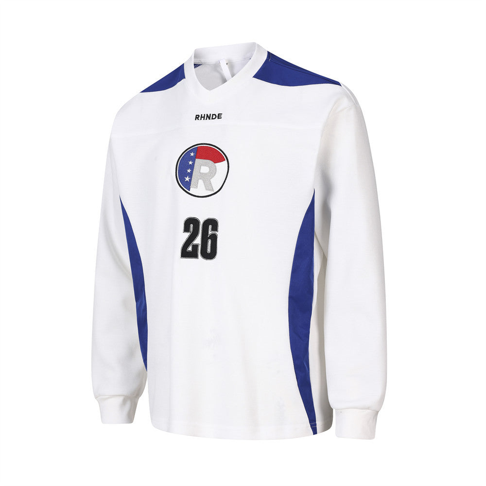 White long sleeve V-neck jersey with blue side panels and chest logo, angled front view