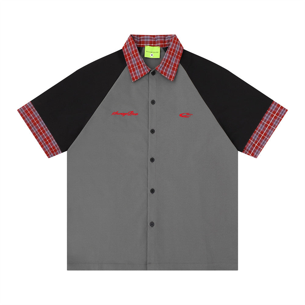 Men's colorblock raglan short sleeve shirt with red plaid collar and cuffs in grey and black