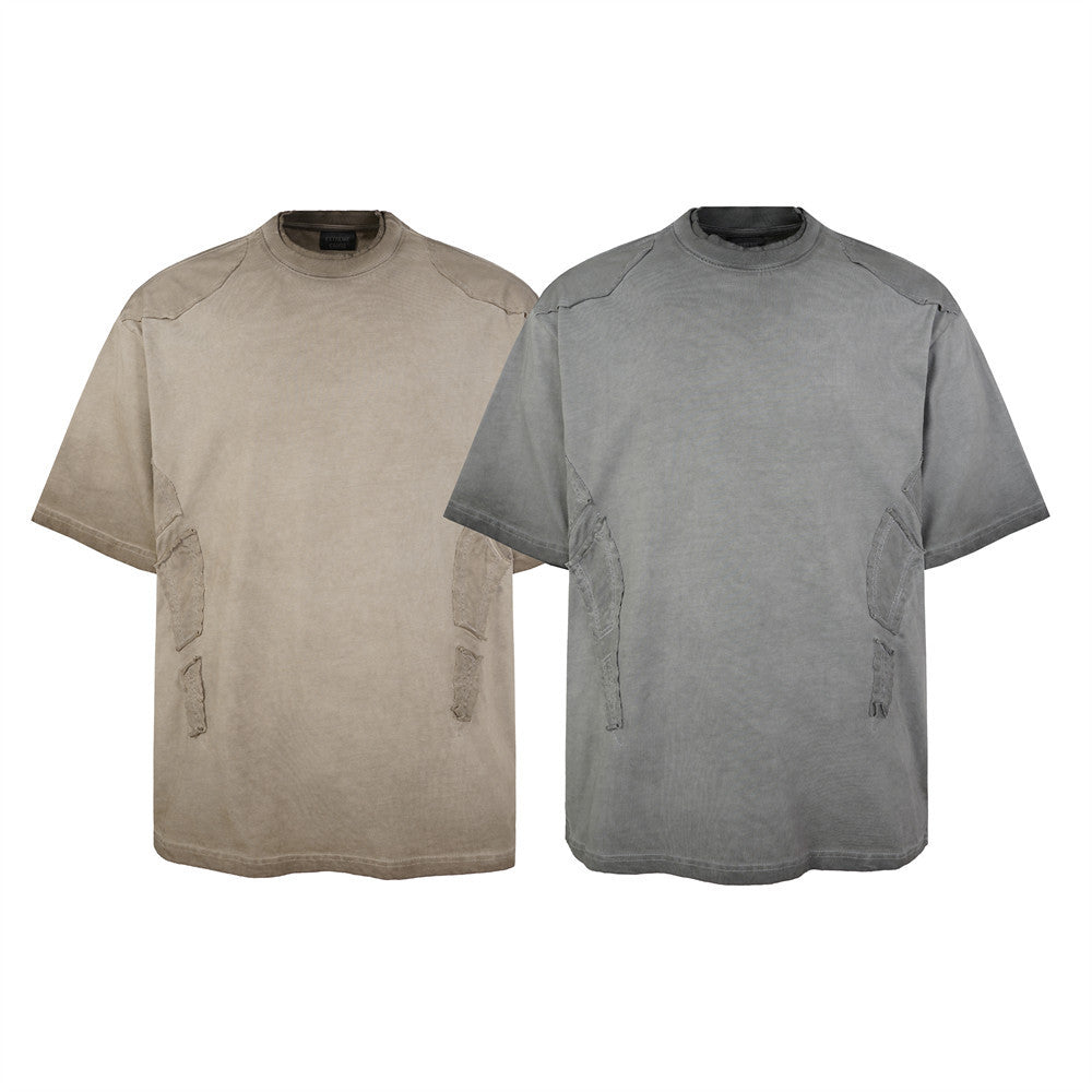 Acid wash distressed oversized cotton t-shirt in sand beige and slate grey with raw-edge patchwork detailing, front and back