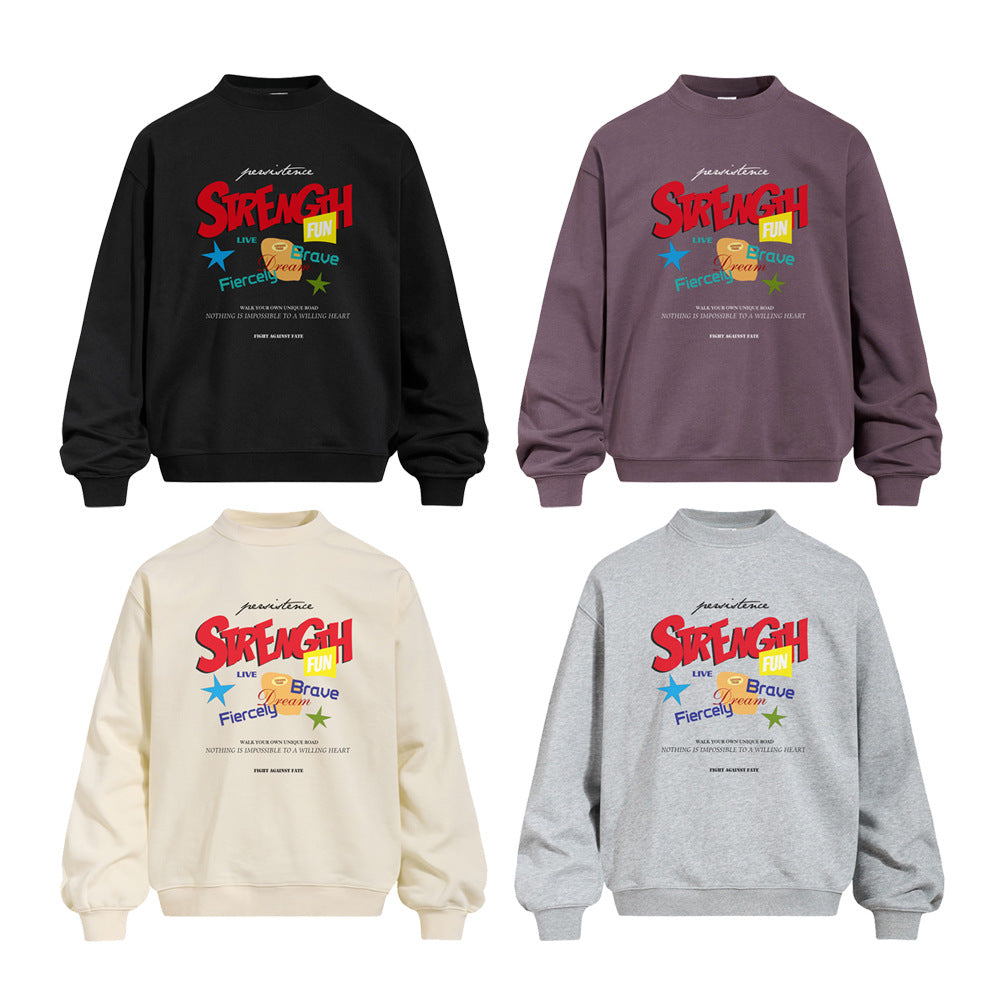 Oversized crewneck sweatshirt with bold multi-color STRENGTH graphic print on chest, shown in four colorways