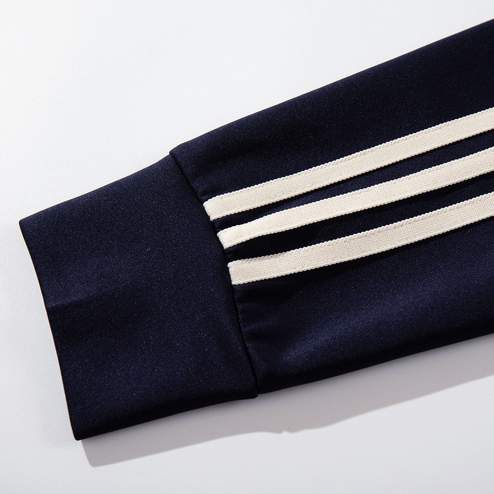 Chaqueta deportiva de hombre con lunares: azul marino con cremallera y bandas en las mangas