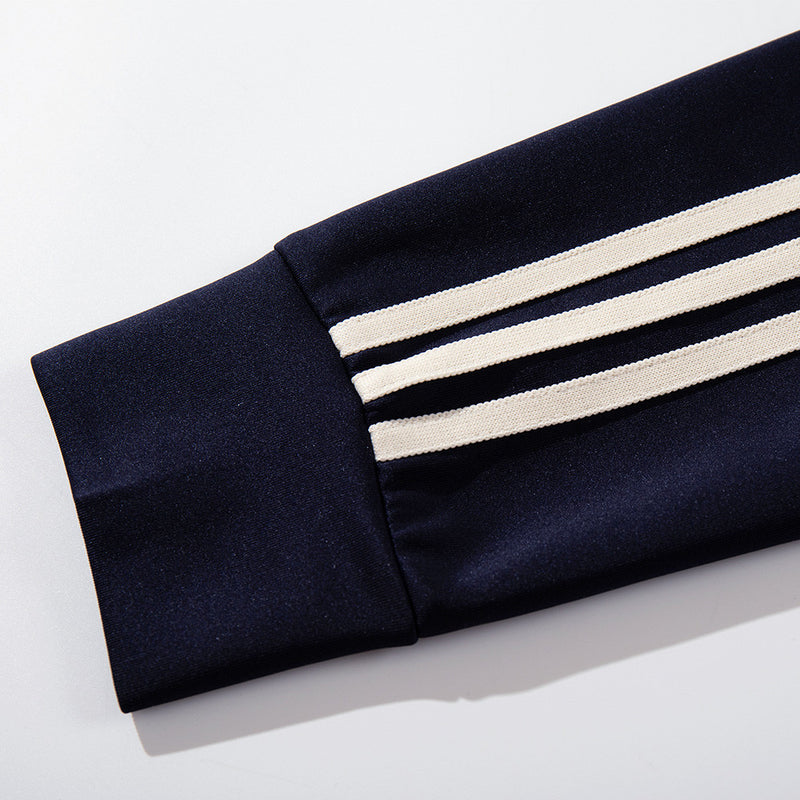 Chaqueta deportiva de hombre con lunares: azul marino con cremallera y bandas en las mangas