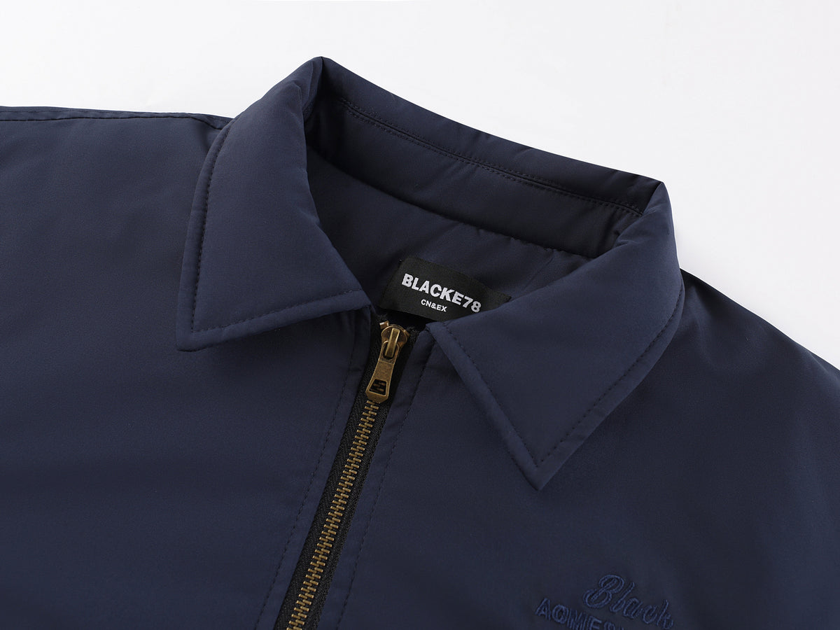 Veste bomber matelassée pour homme avec col à pointes et coutures arrondies