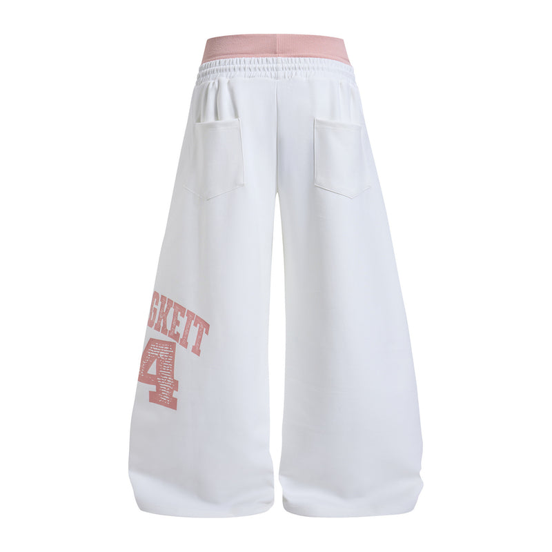 Pantalones de chándal de pierna ancha con estampado gráfico varsity y cintura rosa en contraste