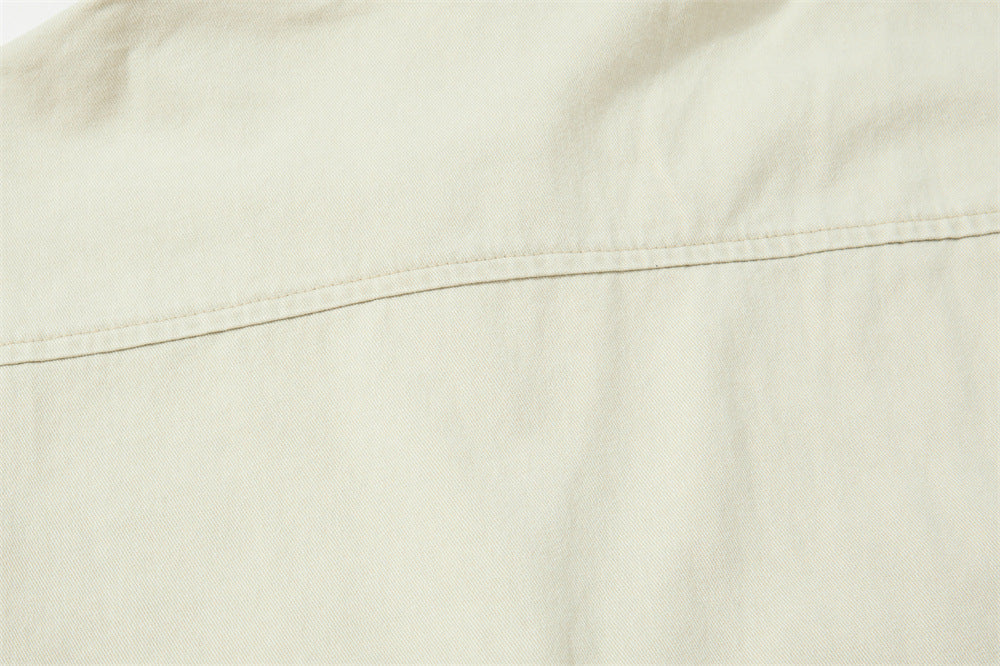Back yoke seam detail on cream shirt