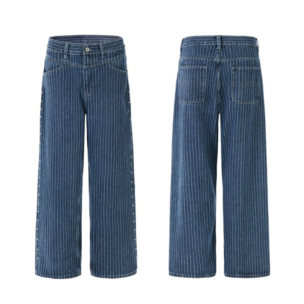 Men's wide-leg blue and white pinstripe jeans with silver rivet studs along the outer leg seam, front and back view