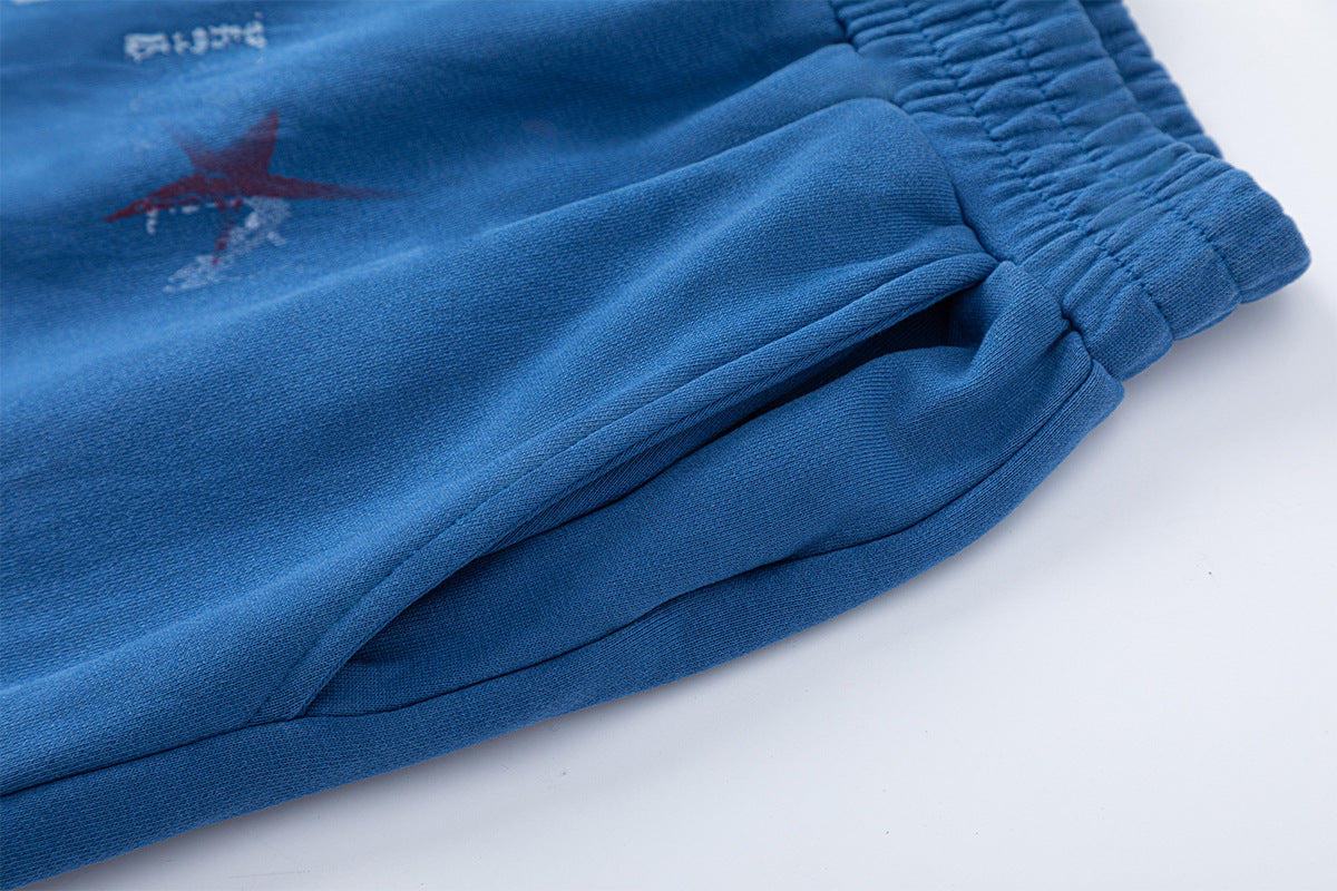 Pantalon de survêtement à jambes larges avec motif d’étoiles et de lettres, coupe décontractée délavée