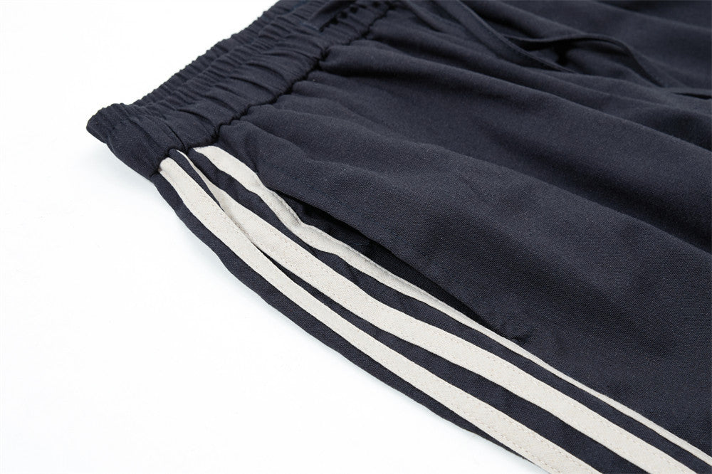 Pantalon de survêtement wide leg – Triple bande latérale, taille élastique à cordon