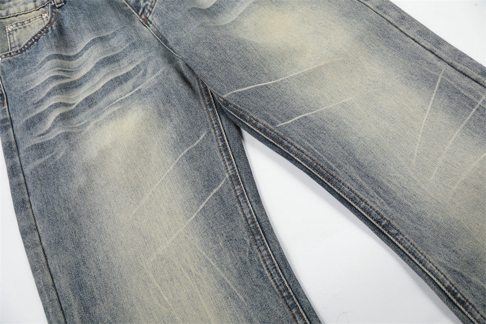 Vintage Washed Wide-Leg Flare Jeans – Distressed Faded Denim with Crease Detail
