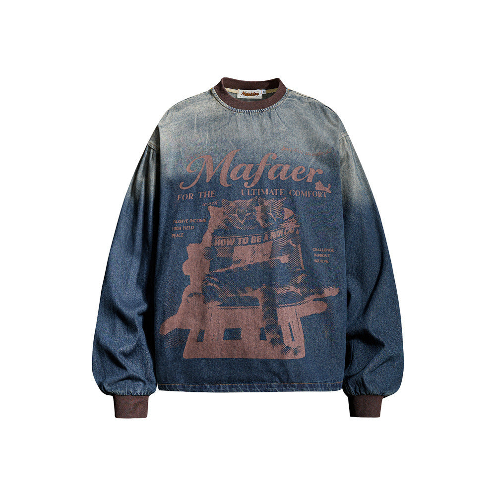 Oversized vintage washed denim crewneck sweatshirt with tie-dye fade and retro graphic cat print on chest