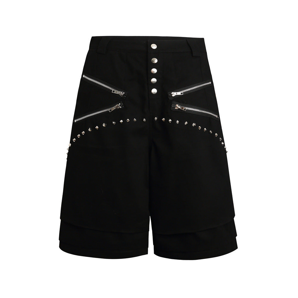 Black wide-leg shorts front view with four zippers and silver stud trim