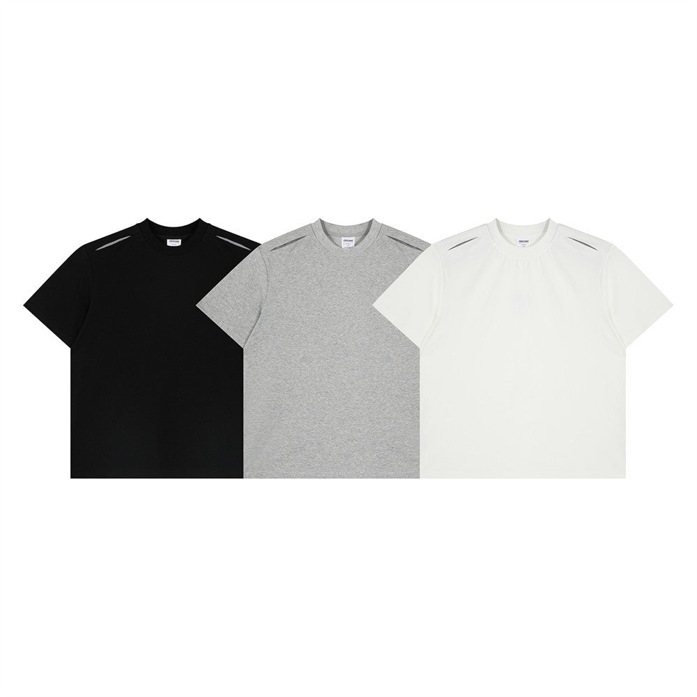 Men's oversized crewneck t-shirt with houndstooth shoulder stitch detail in black, grey, and off-white