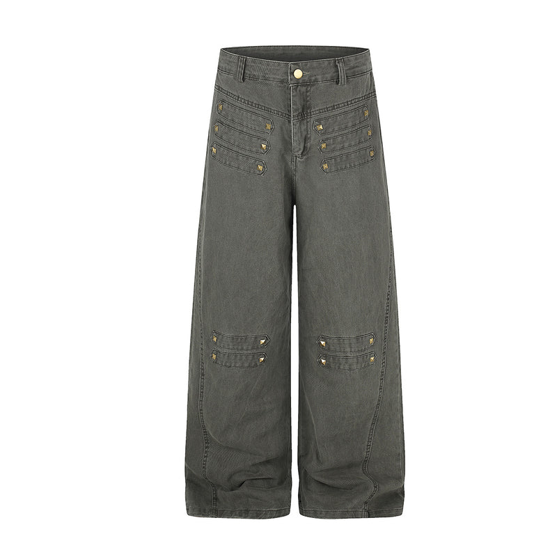 Wide-leg relaxed fit denim pants with gold pyramid studs and stitched panel details in army green and black