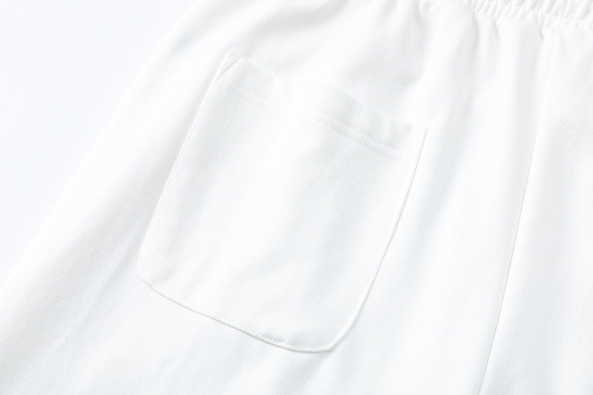 Pantalon de survêtement wide leg avec écusson varsity et motif graphique numéro 28