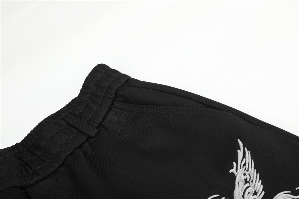 Pantalon de survêtement à jambes larges avec broderie Pégase, imprimé Union Jack et écussons étoile