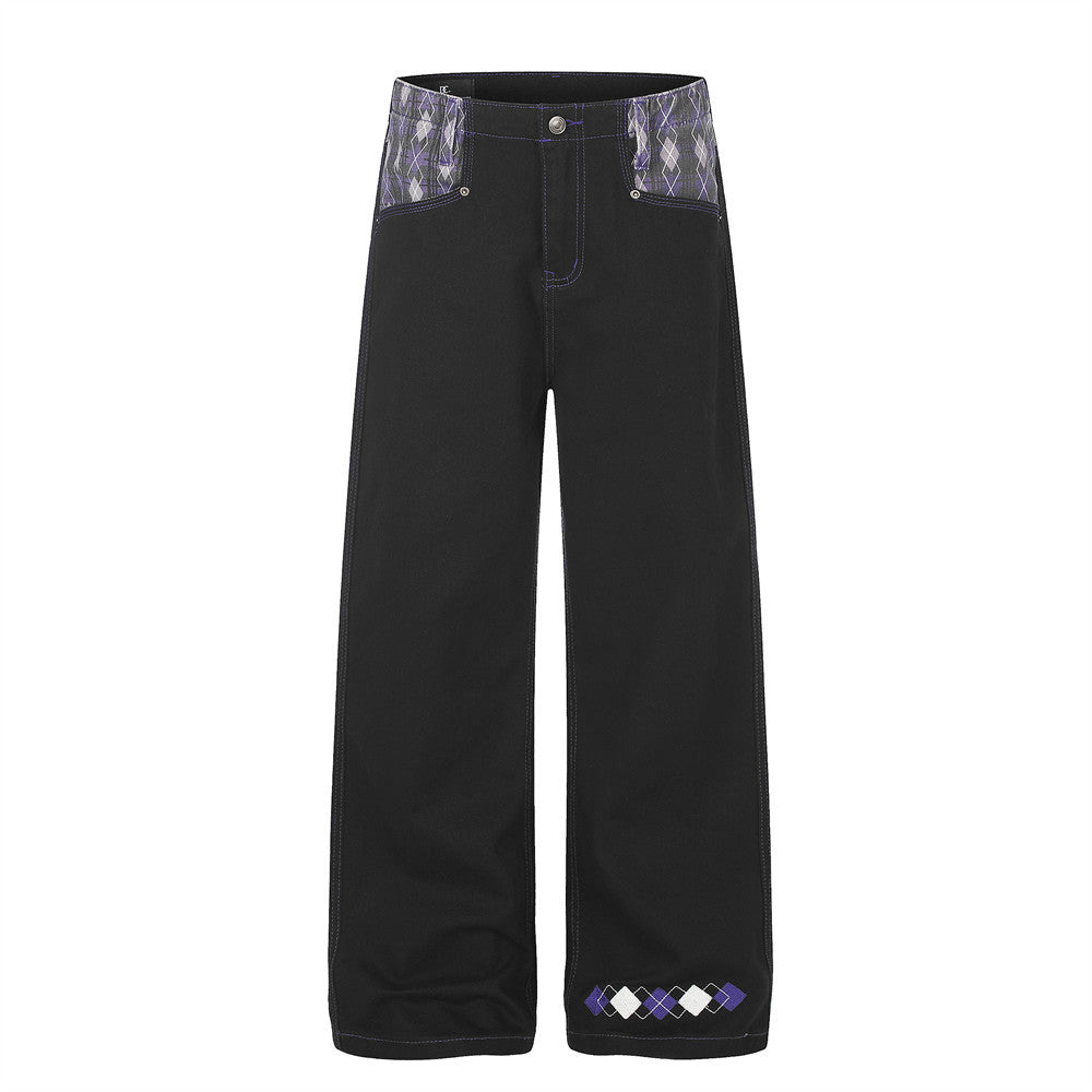 Black wide-leg jeans with argyle patchwork waistband and embroidered hem detail, front view