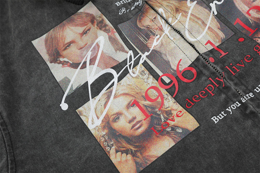 Close-up of black jacket front graphic with portrait collage and red printed text