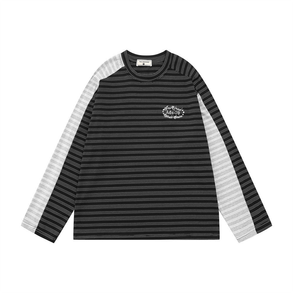 T-shirt homme oversize noir et blanc à rayures color block et manches longues, avec empiècements de manches contrastants et grand motif brodé sur la poitrine