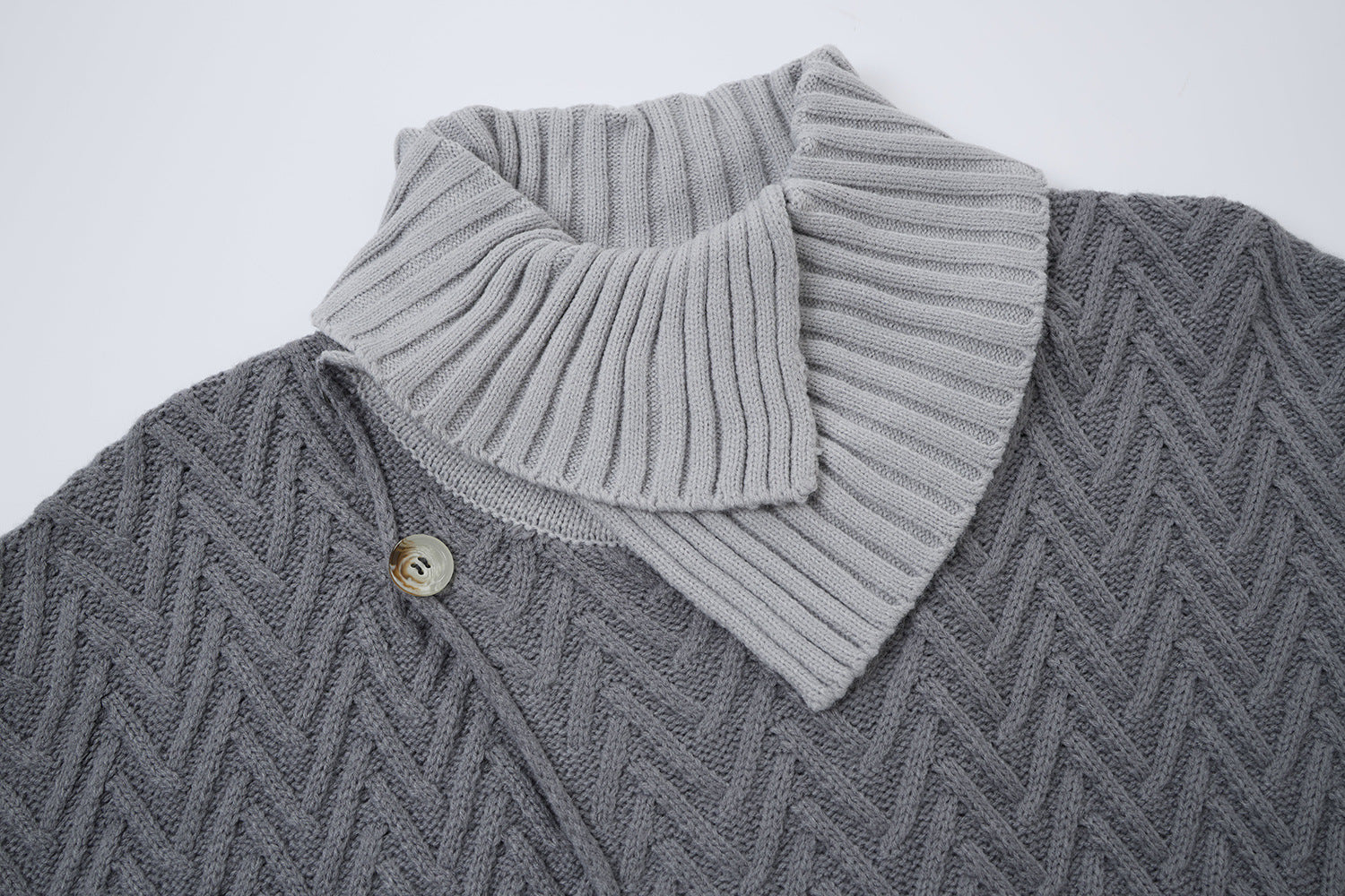 Cardigan en maille torsadée chevrons avec col châle et poches avant