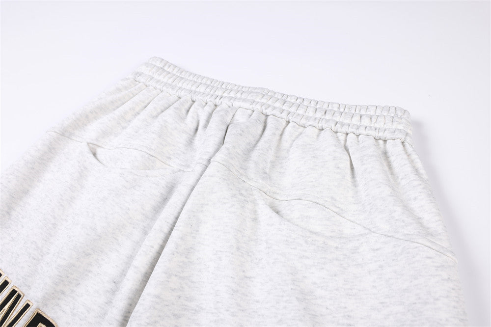 Pantalon de survêtement homme coupe wide leg – Étoiles, lettrage et cordon plissé