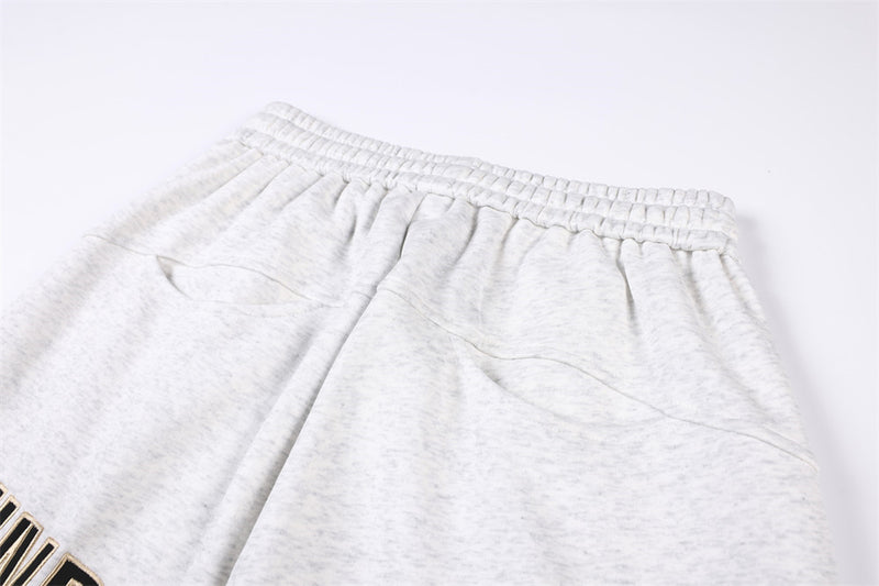 Pantalon de survêtement homme coupe wide leg – Étoiles, lettrage et cordon plissé