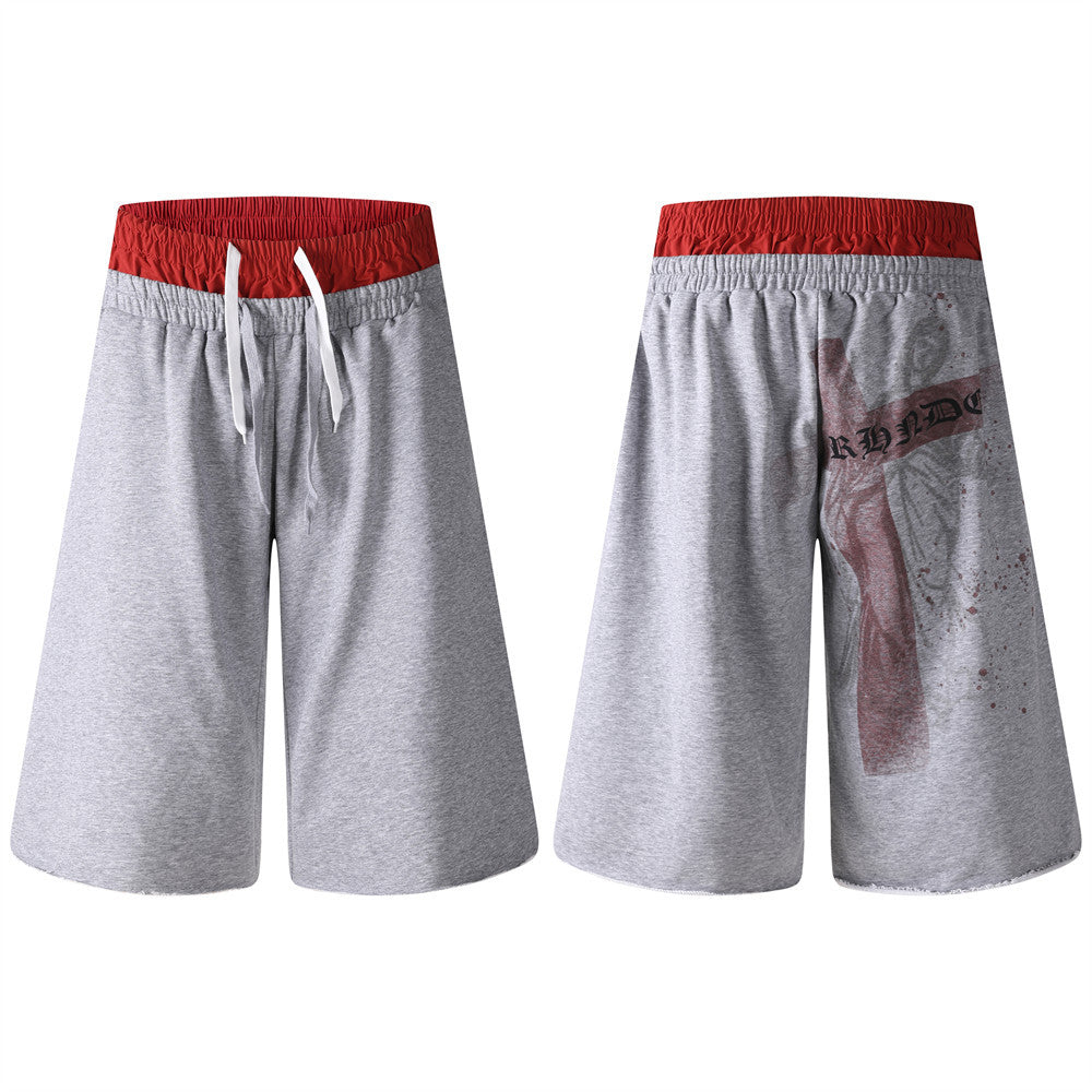 Men's grey and red colorblock sweat shorts with cross ink-splash graphic on back, faux double-waistband streetwear style