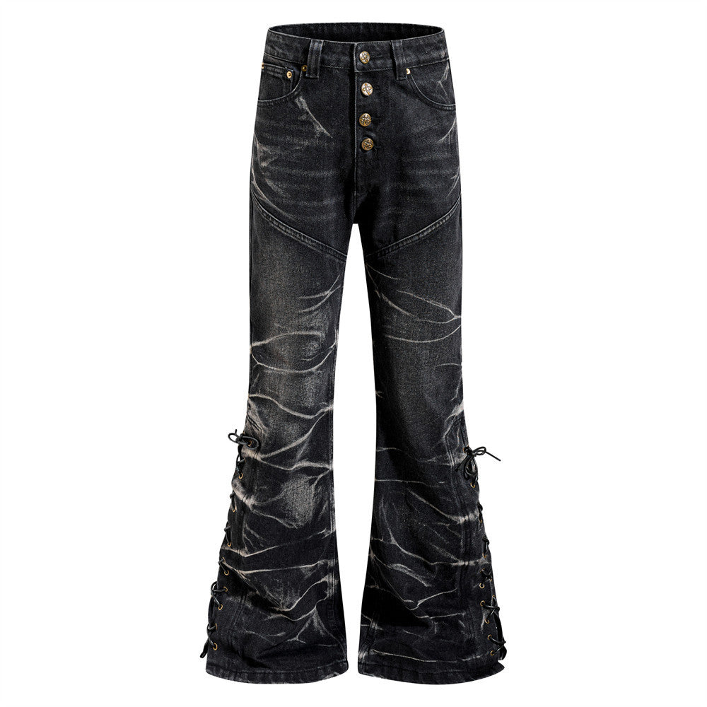 Men's black acid wash bell bottom flare jeans with lace-up hem ties and antique gold button fly, front and back view