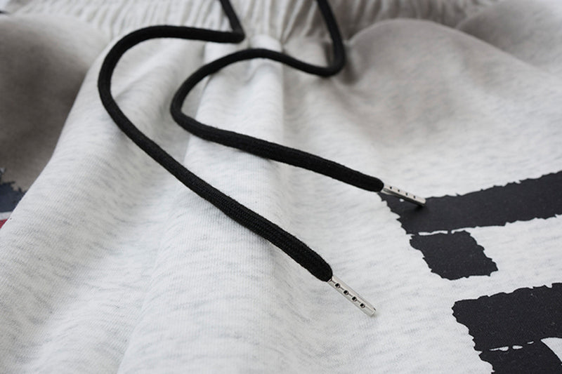 Wide-Leg-Sweatpants mit Union-Jack- und „Let's Rock On“-Print, Seitenstreifen