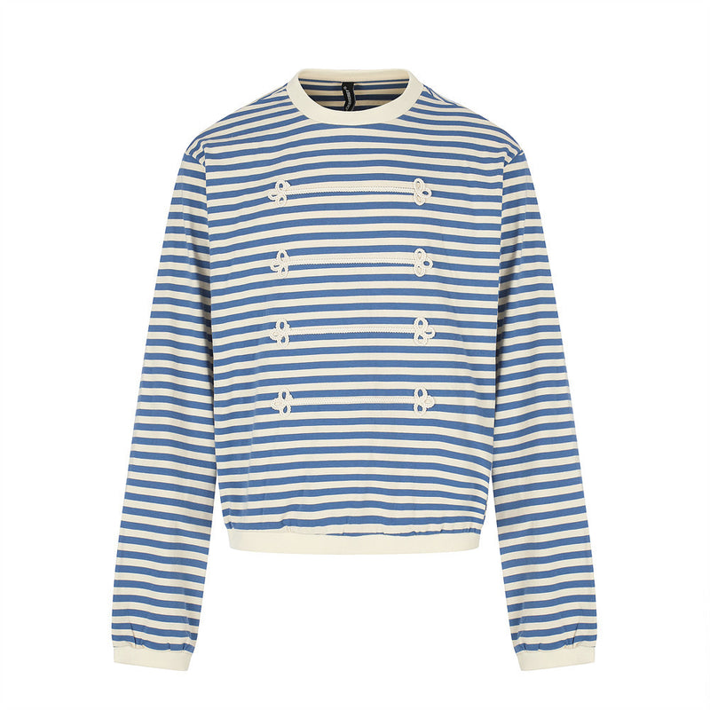 Blue and cream striped long sleeve shirt with contrast trim and floral knit front, flat view
