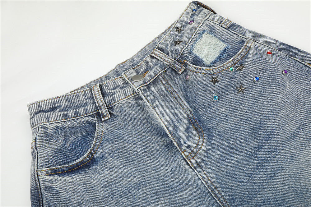 Jean large déchiré pour homme avec ornements en strass et étoiles