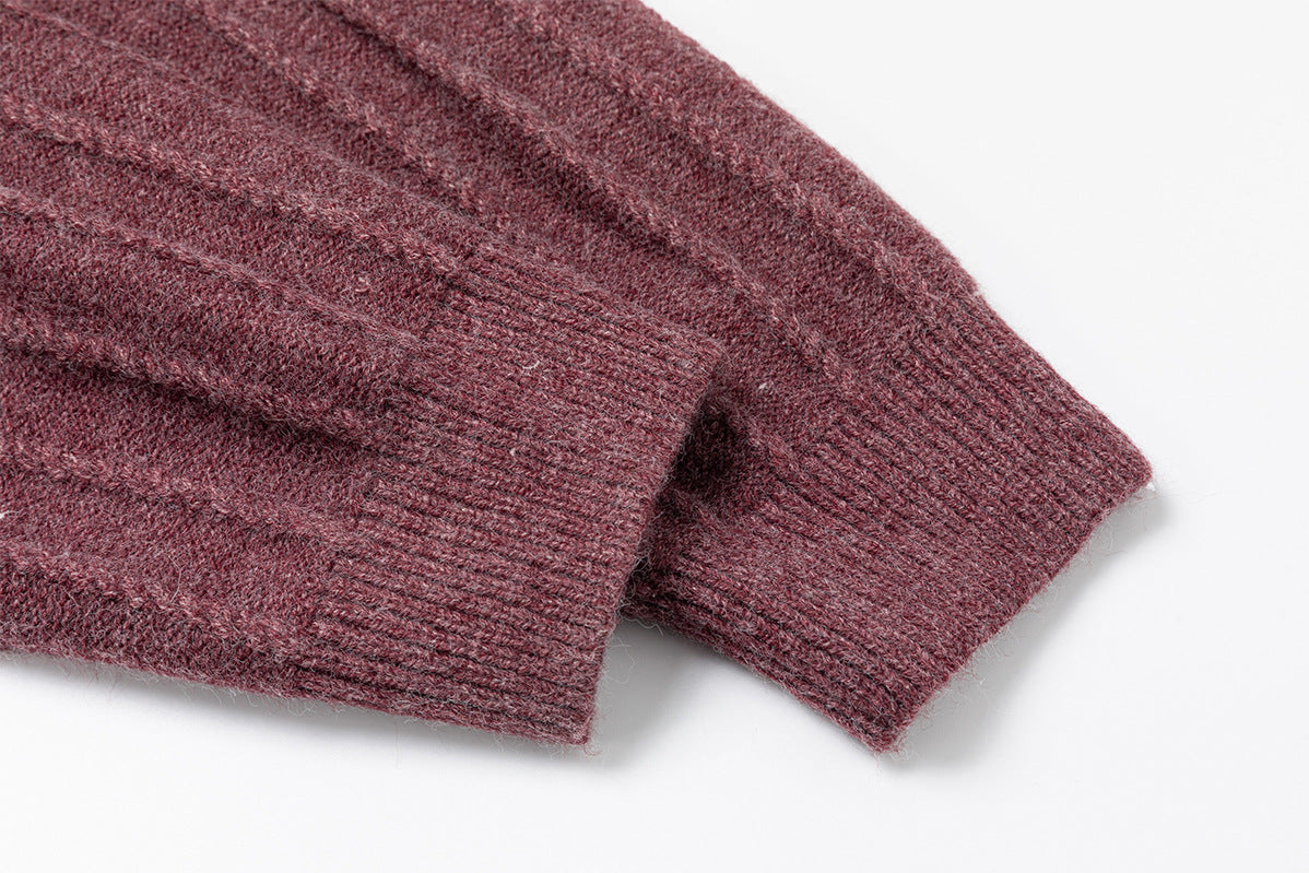 Pull col roulé en maille torsadée avec détail boutonné en diagonale