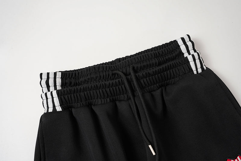 Ensemble veste de survêtement rétro à trois bandes et pantalon large avec écusson brodé
