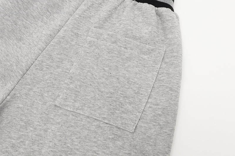 Jogginghose mit weitem Bein und gestreiftem Kontrastbund – Fleecehose mit Relaxed Fit