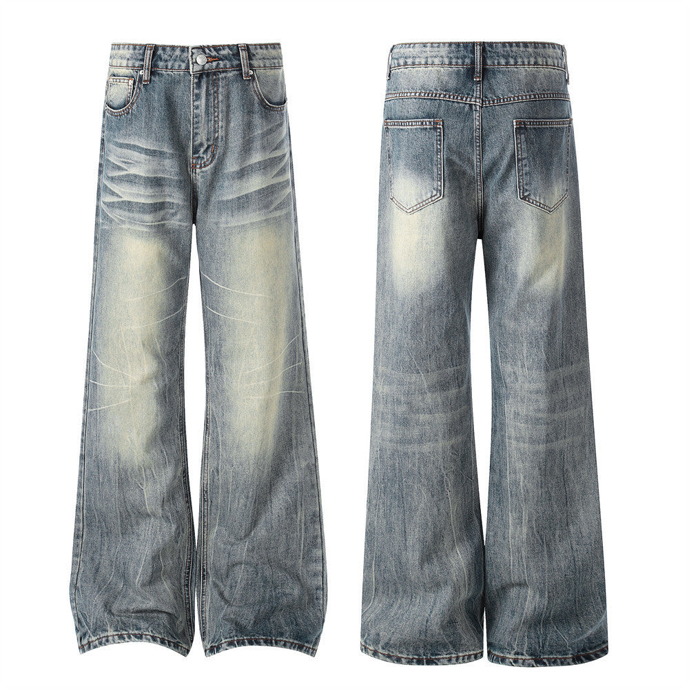 Vintage Washed Wide-Leg Flare Jeans – Distressed Faded Denim with Crease Detail