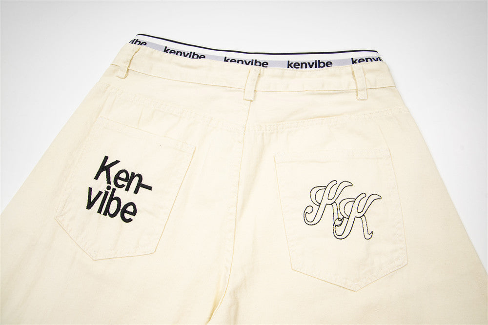 Wide-Leg Jeans with Letter Embroidery & Logo Waistband — Off White