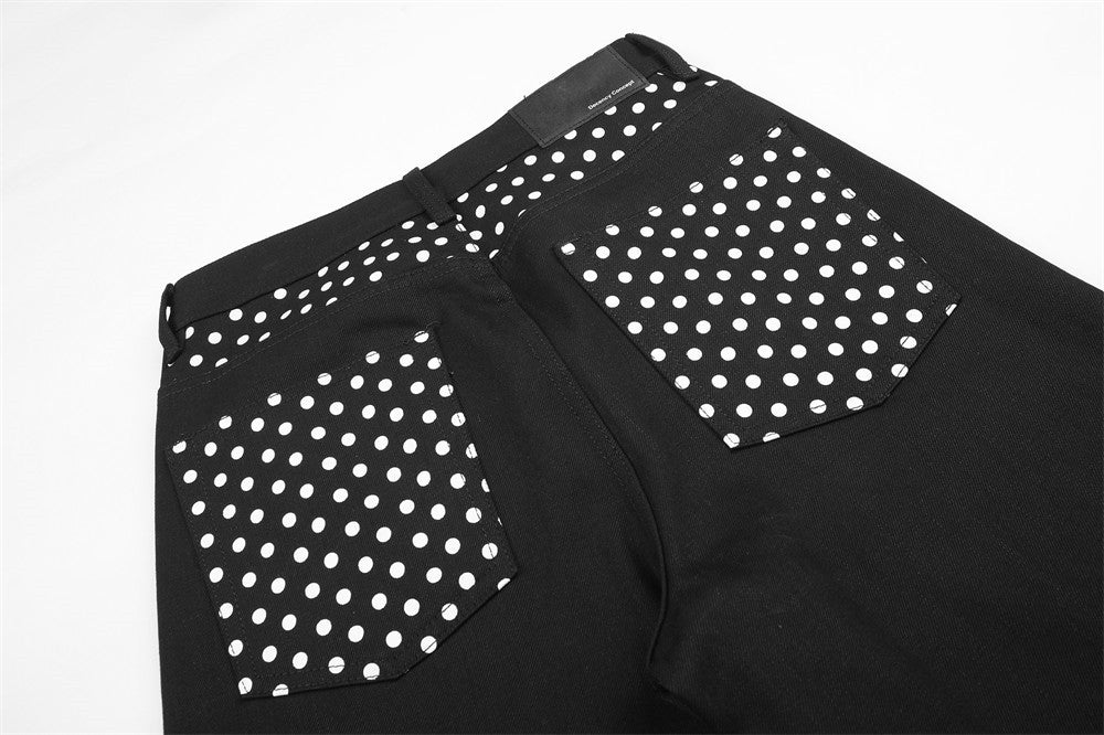 Pantalon à jambes larges avec poches contrastantes à pois et revers aux ourlets
