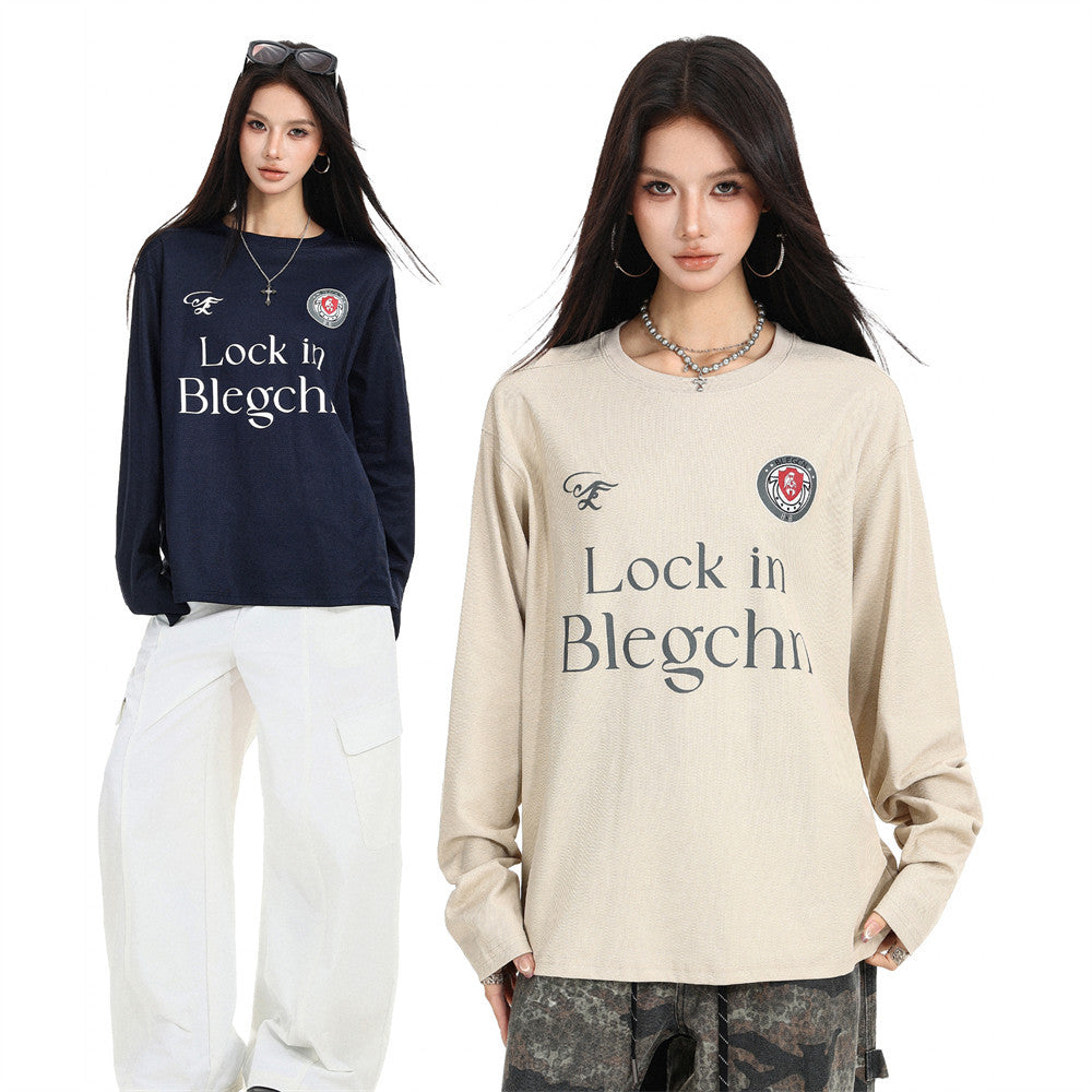 Black and beige long sleeve crew neck tees worn by models, front views with chest graphics