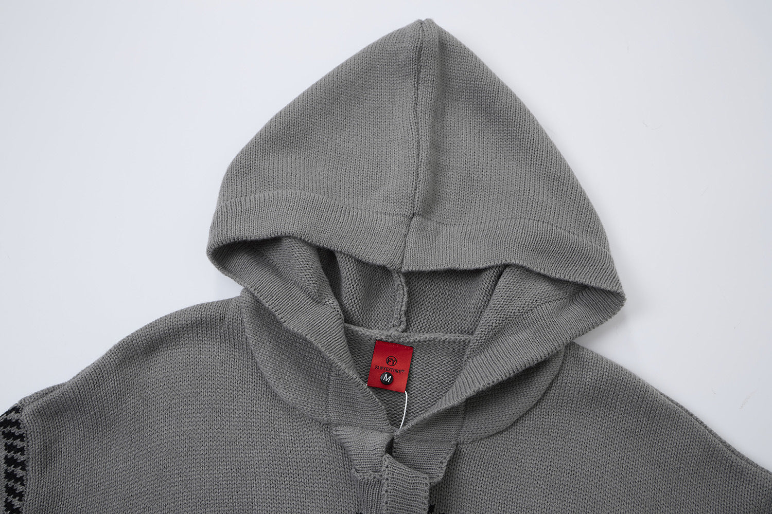 Pull à capuche oversize en maille jacquard avec grand motif graphique sur le devant