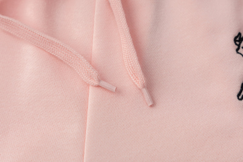 Pantalon de survêtement wide leg – Rose délavé avec bande latérale et écusson brodé