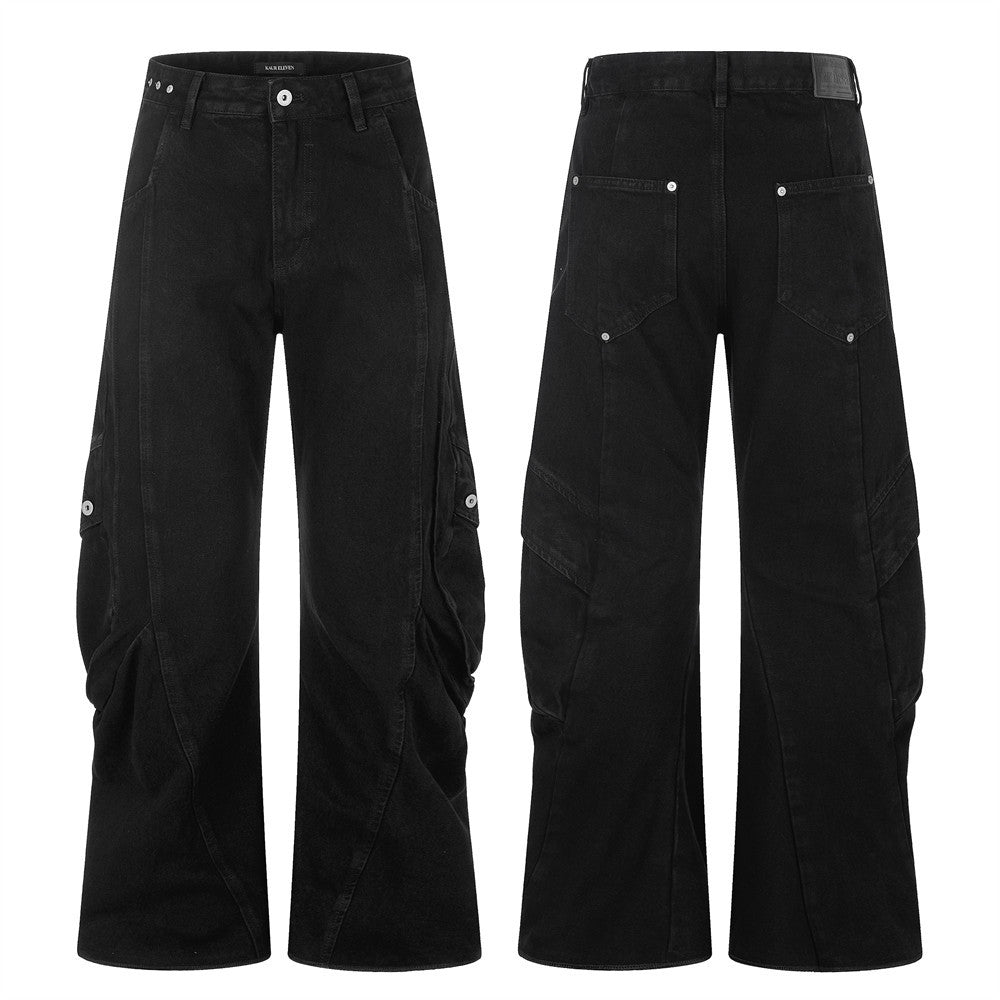 Wide-leg washed black cargo jeans with pleated side panels and multiple snap-button pockets, front and back view