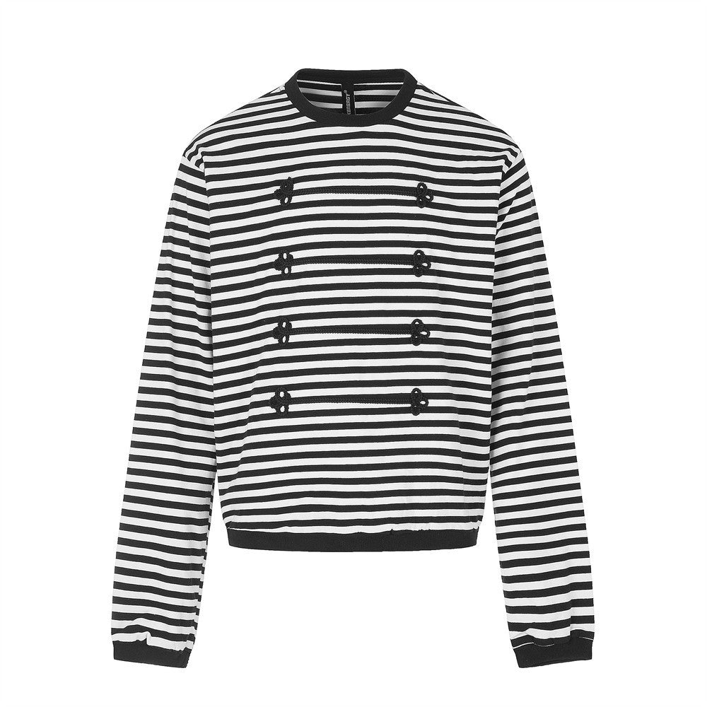 Black and white striped long sleeve shirt with contrast trim and floral knit front, flat view