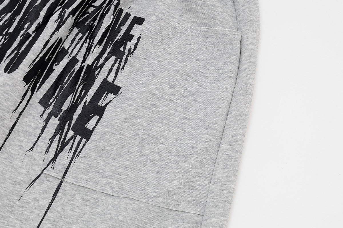 Jogginghose mit weitem Bein zum Hineinschlüpfen, gestreiftem Bund und Gothic-Grafikprint
