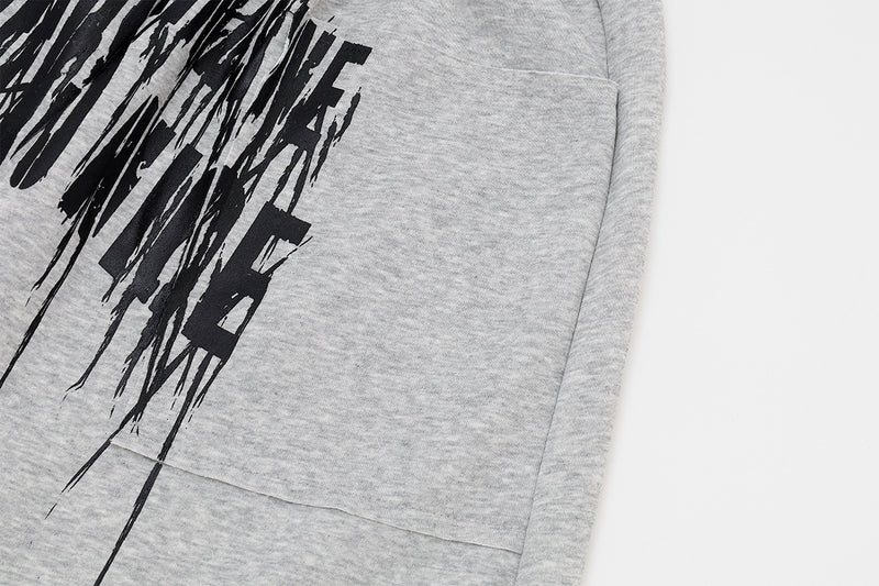 Jogginghose mit weitem Bein zum Hineinschlüpfen, gestreiftem Bund und Gothic-Grafikprint