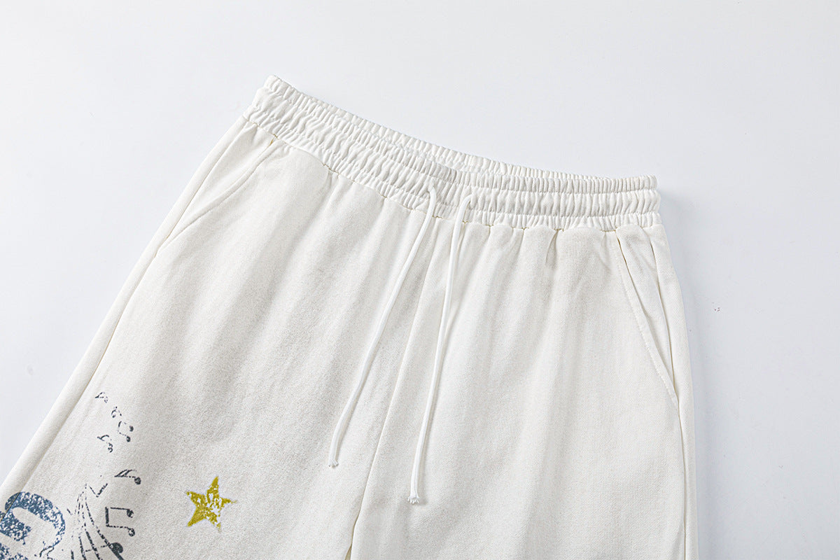 Pantalon de survêtement à jambes larges avec motif de notes de musique, coupe décontractée délavée