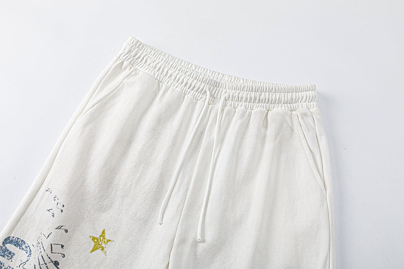 Pantalon de survêtement à jambes larges avec motif de notes de musique, coupe décontractée délavée