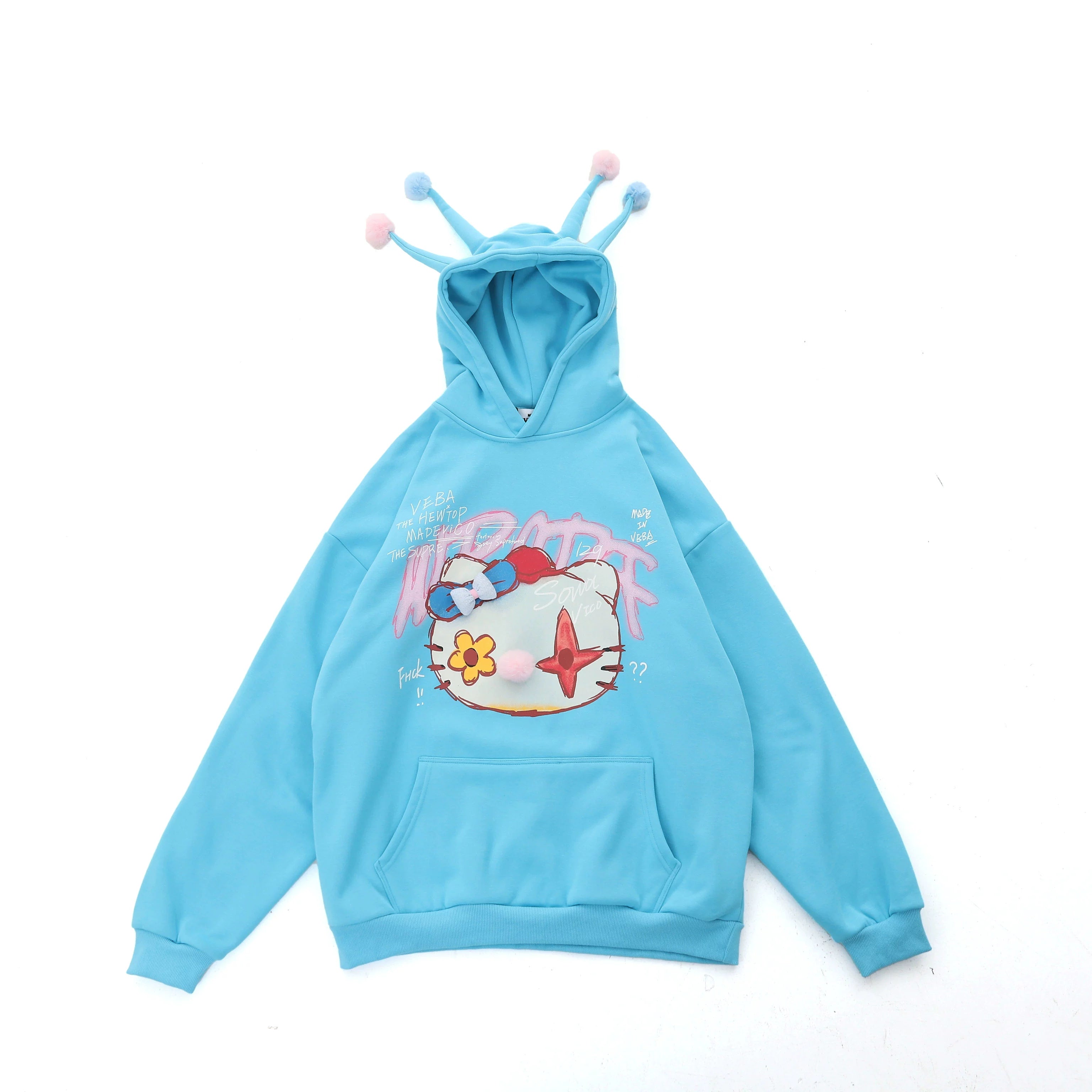 This Kawaii Pom-Pom Crown Hoodie by Seakoff features a cute grey design with a unique cat graphic, 3D pom details, and &quot;VADER FORGET RUNNING&quot; printed in pink and white on the chest. Perfect for streetwear enthusiasts seeking a playful vibe.