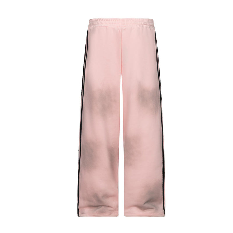 Pantalon de survêtement wide leg – Rose délavé avec bande latérale et écusson brodé